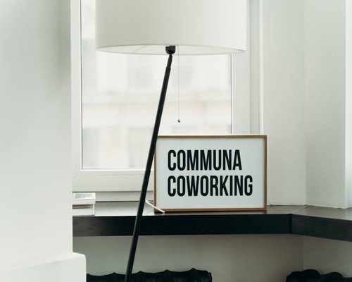 Modern coworking space in Madrid with ample natural light and wide desks